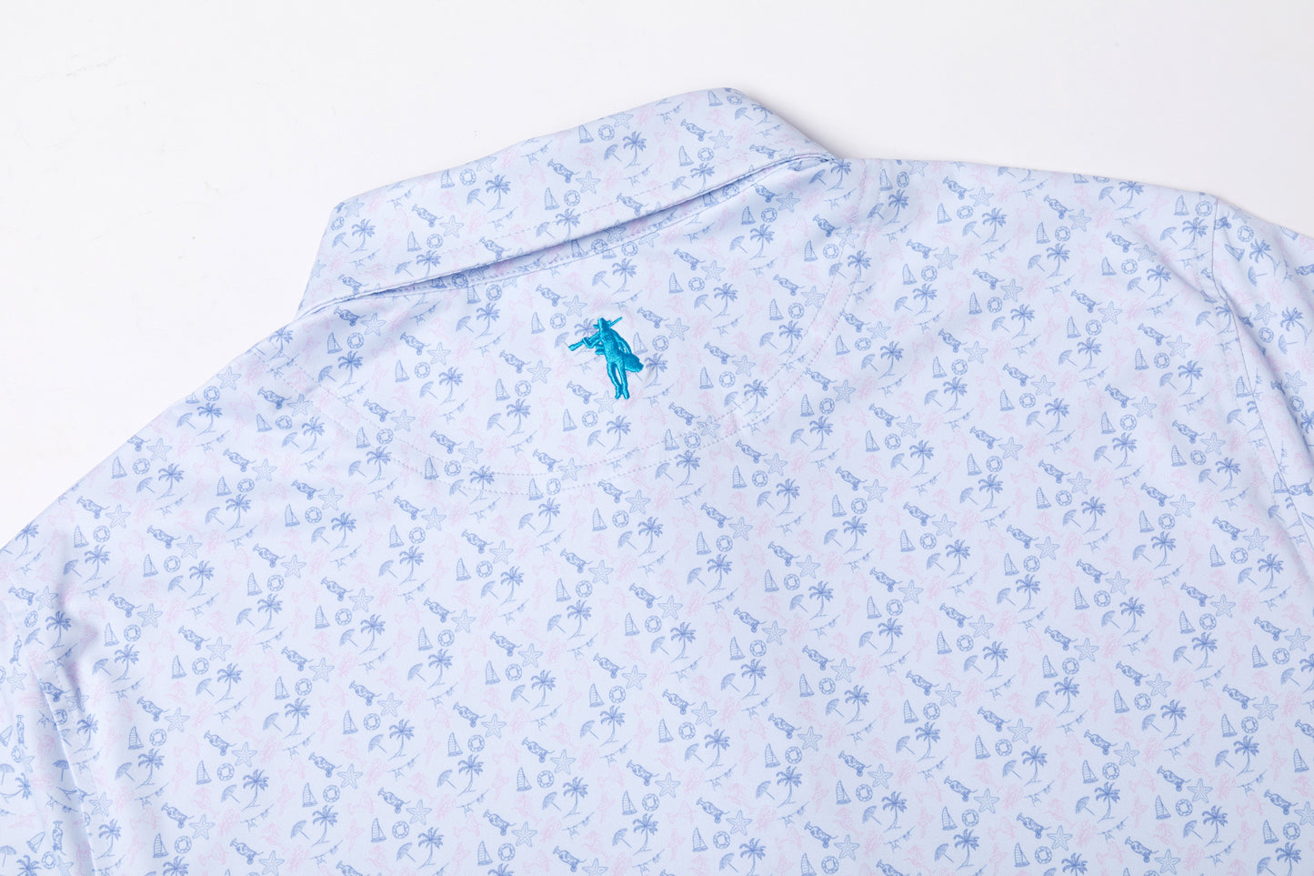 Light blue floral-patterned shirt with a small logo on a white background