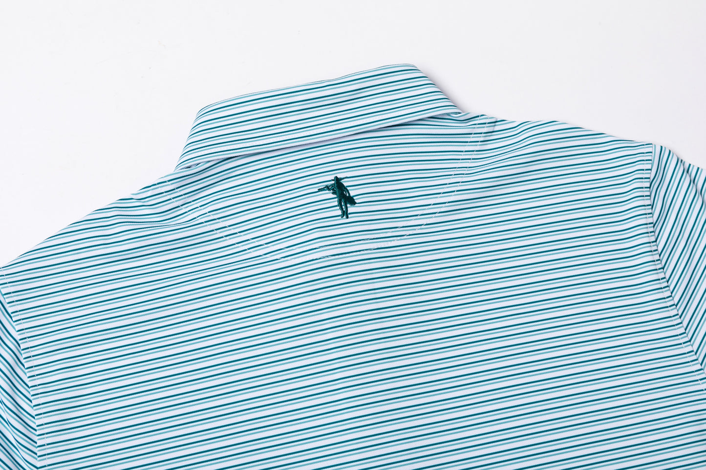 Teal and white striped polo shirt with a small logo on a light gray background