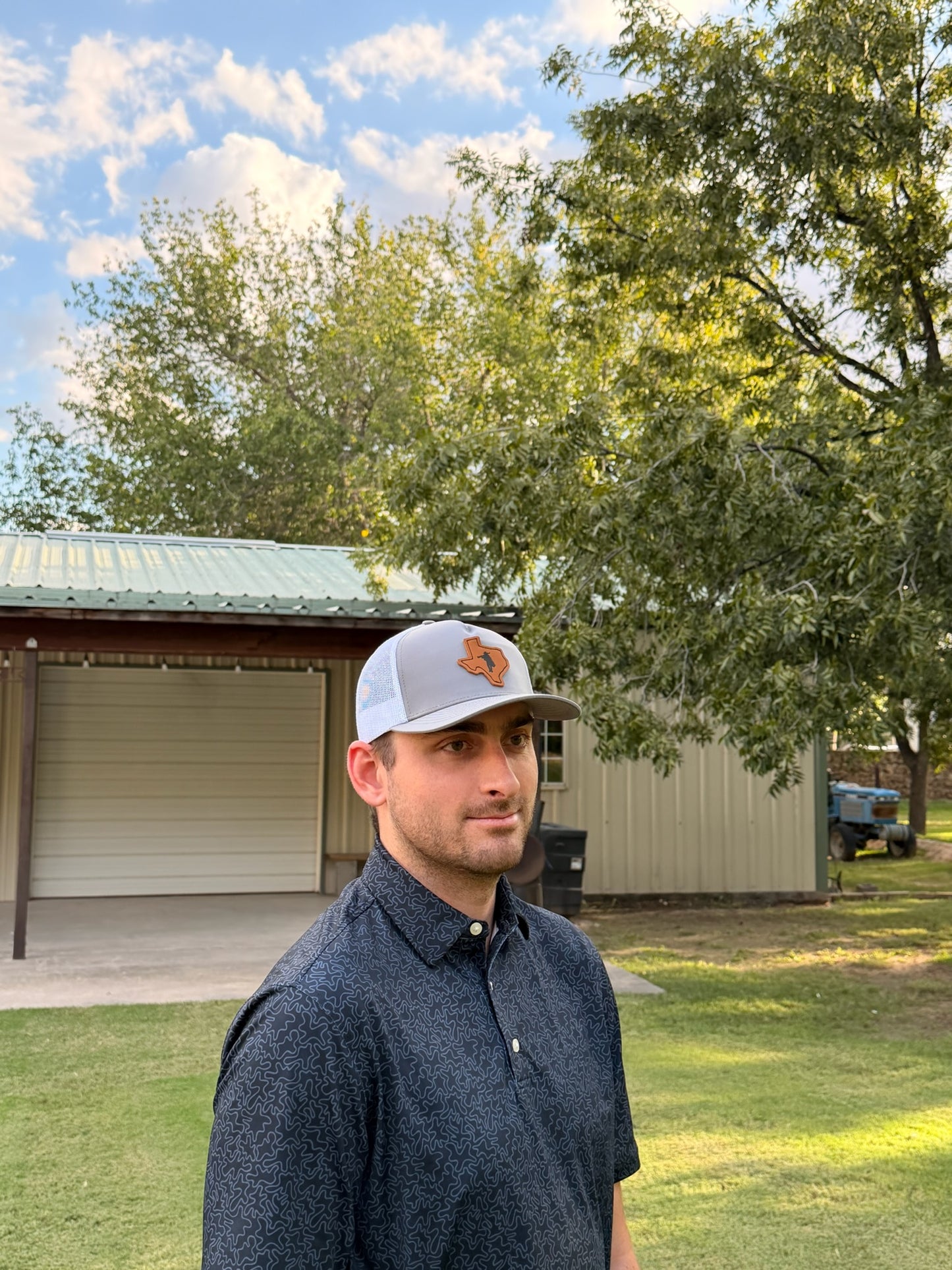 Grey and White trucker cap with leather patch by Thomas Adams Apparel