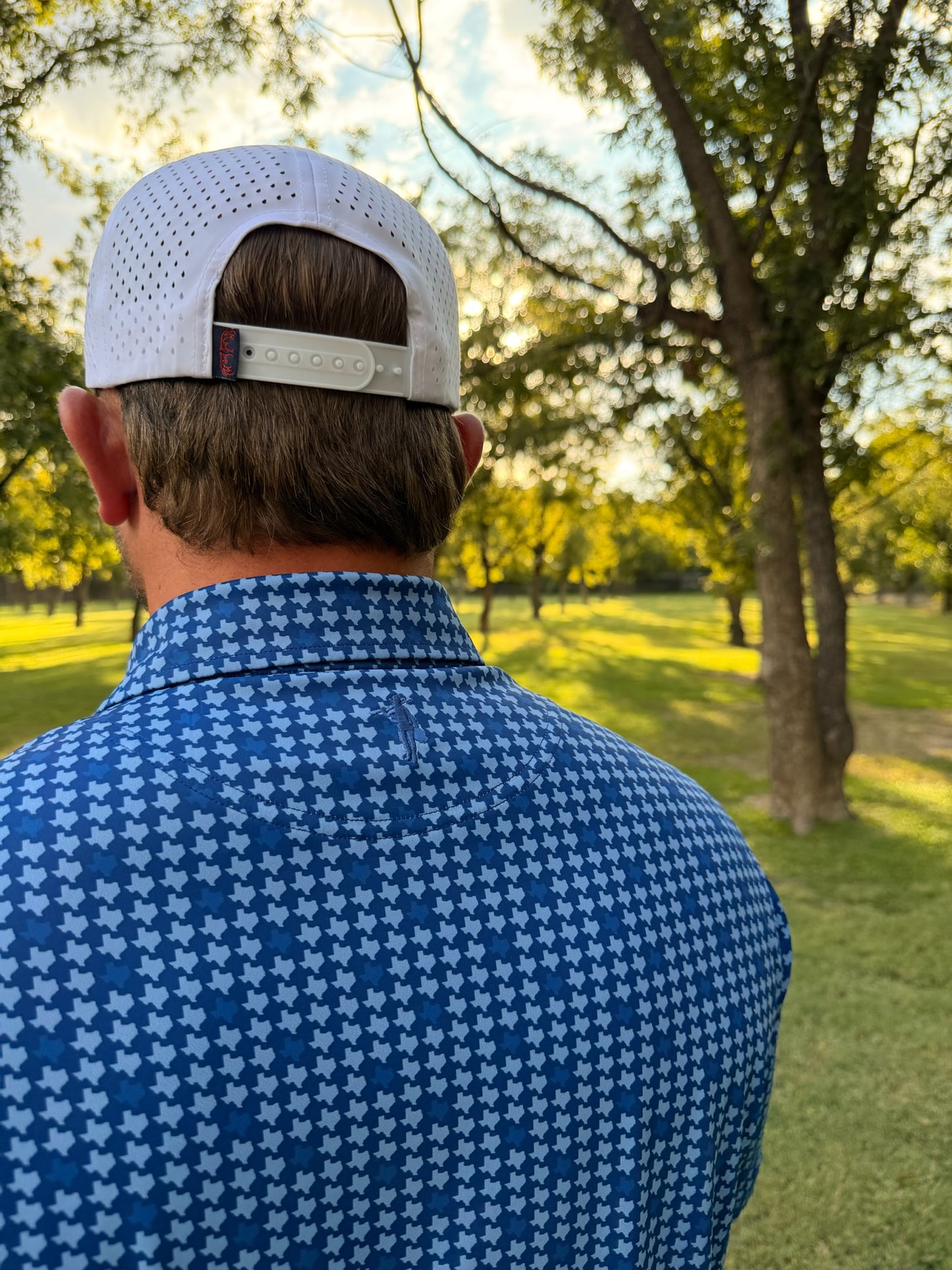 Men's blue Texas performance polo shirt by Thomas Adams Apparel