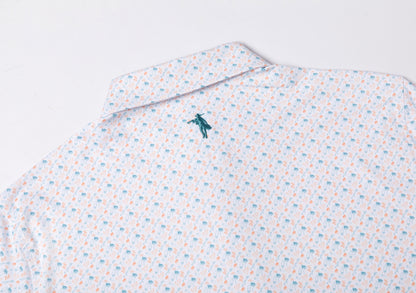 Patterned shirt with a small logo on a light gray background