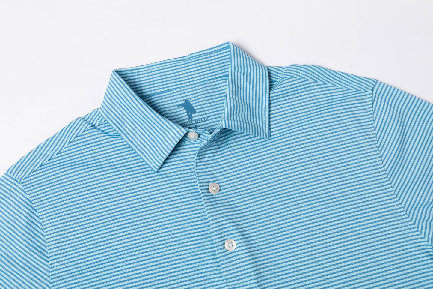 Light blue striped polo shirt on a white background