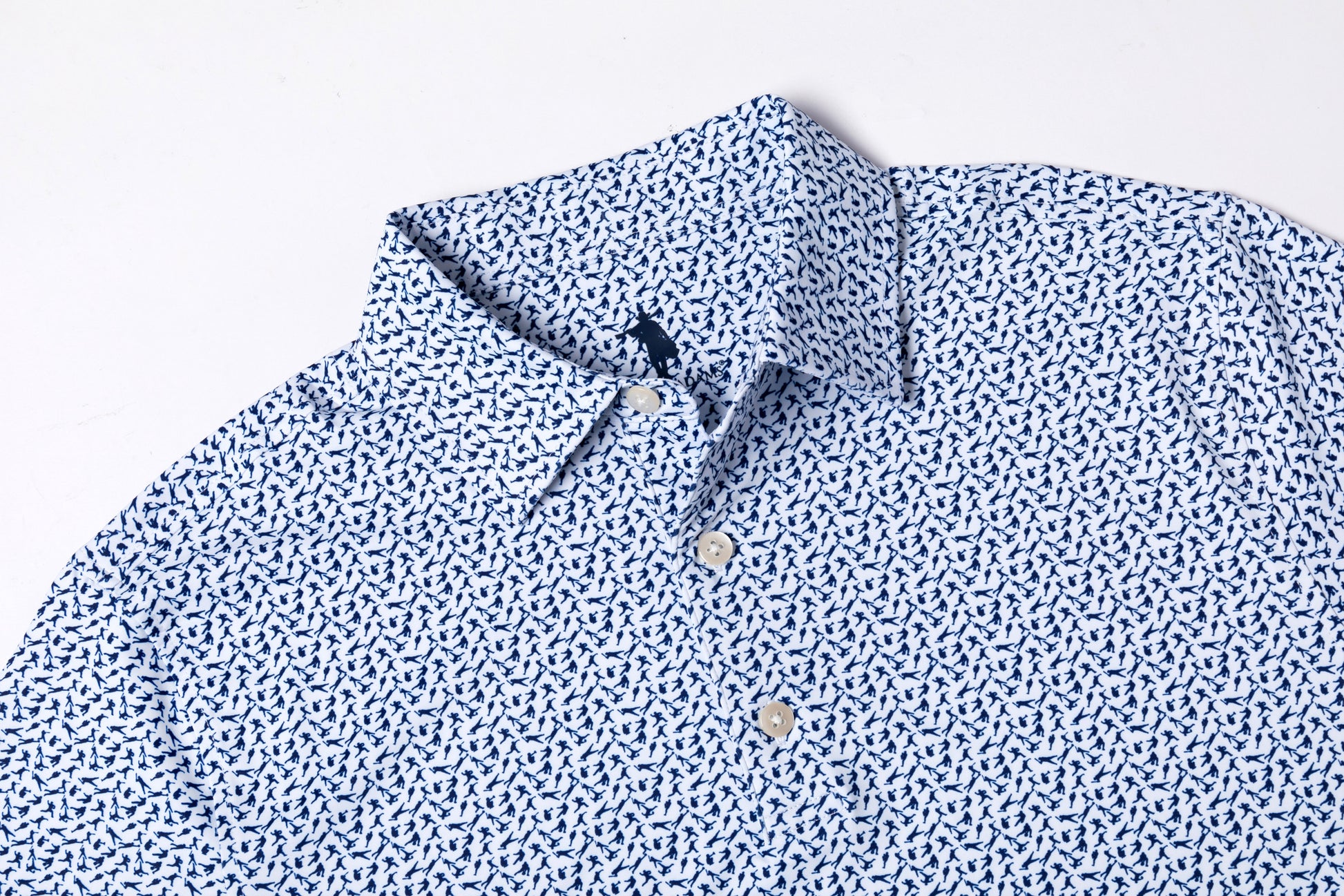 Blue patterned shirt on a light gray background