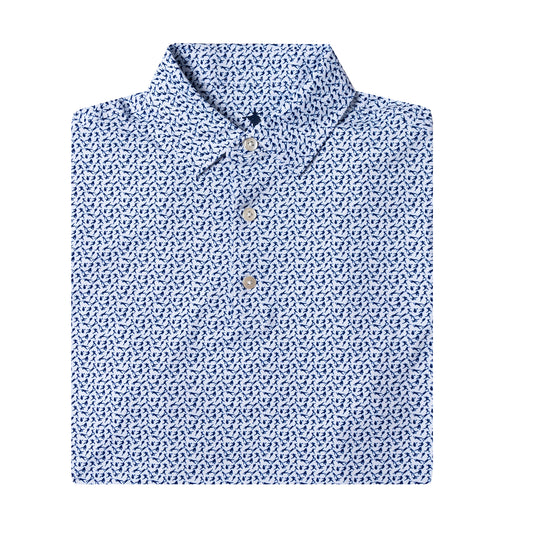 Folded blue patterned shirt on a white background