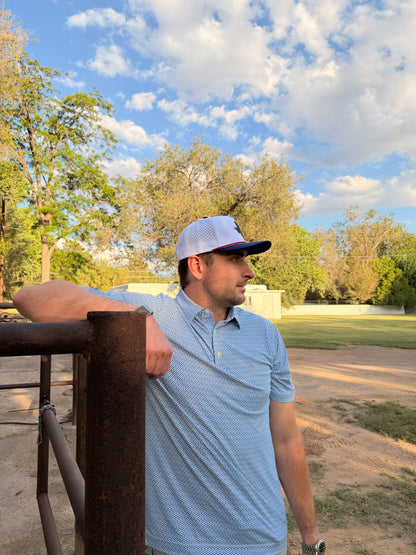 Men's white geometric performance polo shirt by Thomas Adams Apparel