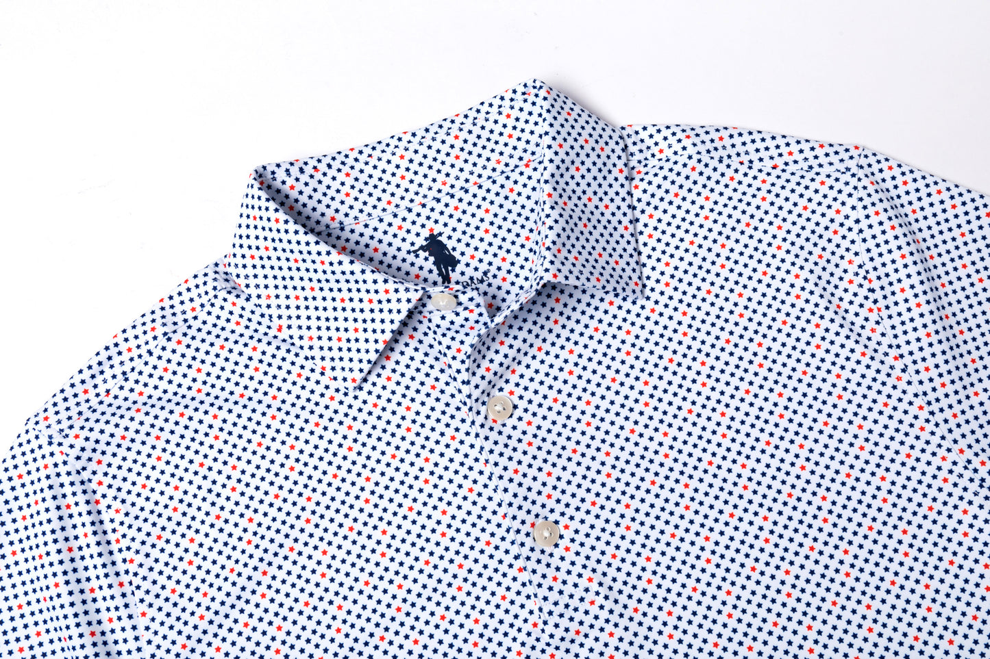 Close-up of a patterned shirt with a collar on a white background