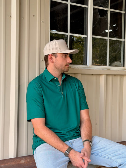 Men's green performance polo shirt by Thomas Adams Apparel