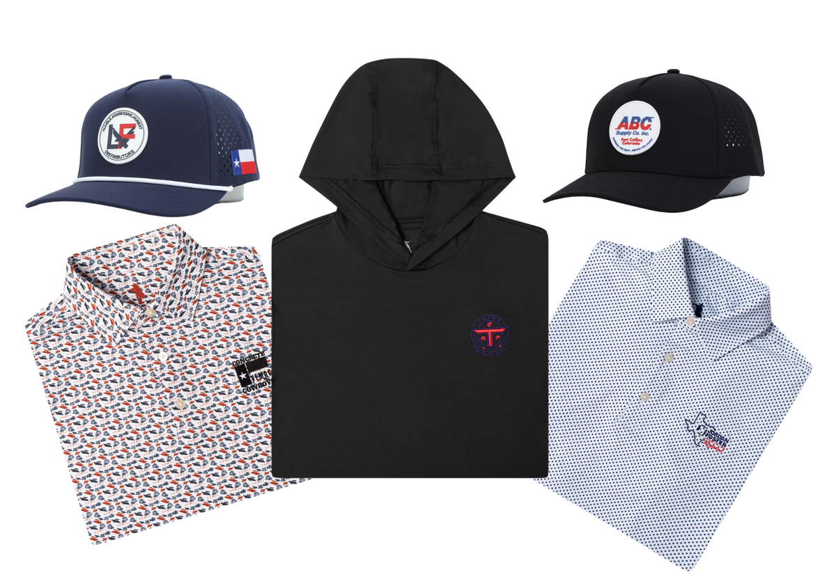 A flat-lay product collection featuring a black pullover hoodie with a small red and blue cross logo on the chest, a navy blue baseball cap with a circular logo, a black baseball cap with a circular logo, a folded white patterned collared shirt, and a folded white micro-check patterned collared shirt with a logo on the chest.