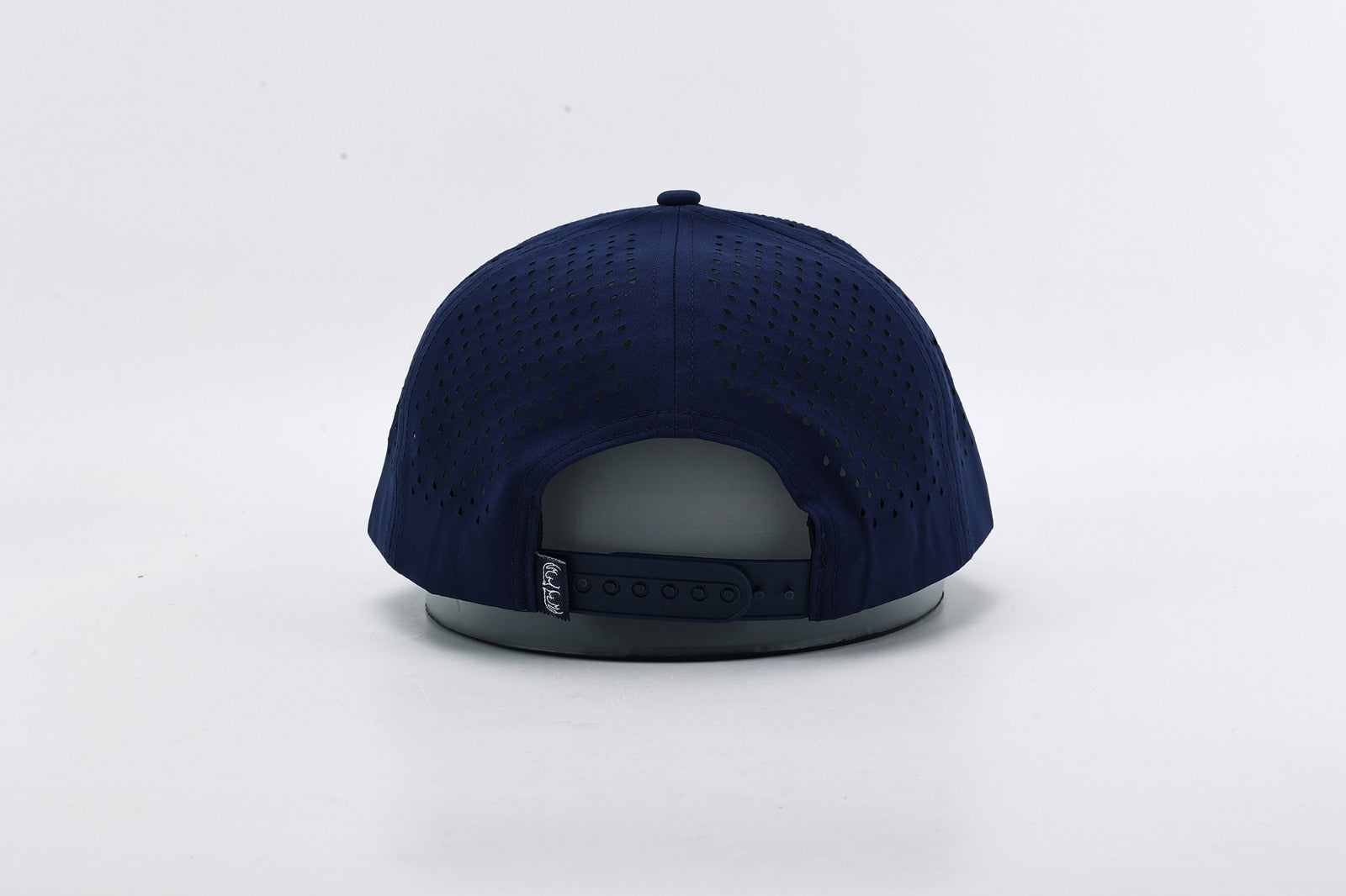 Navy blue cap on a light gray background