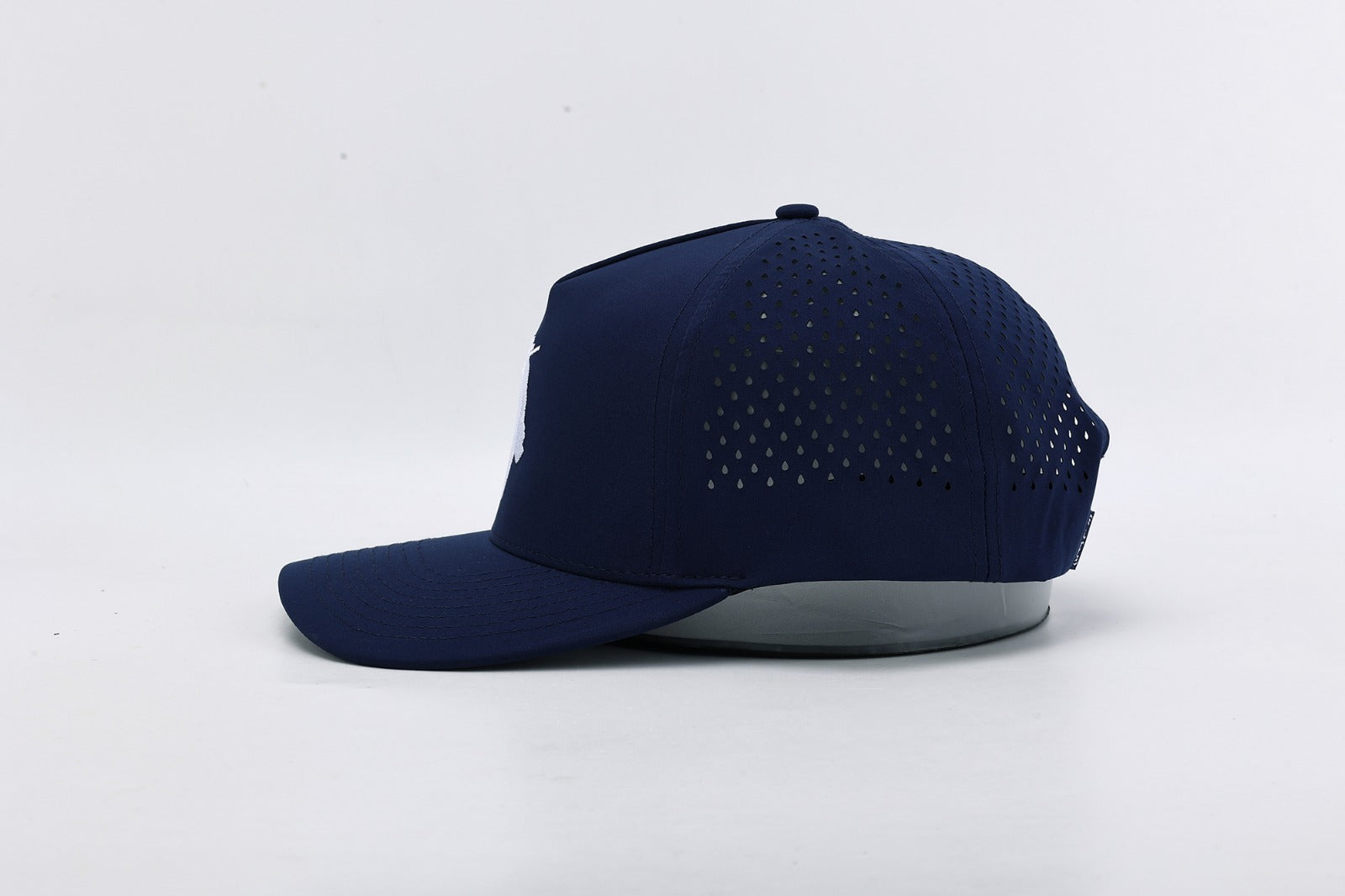 Navy blue cap with gray brim on a white background