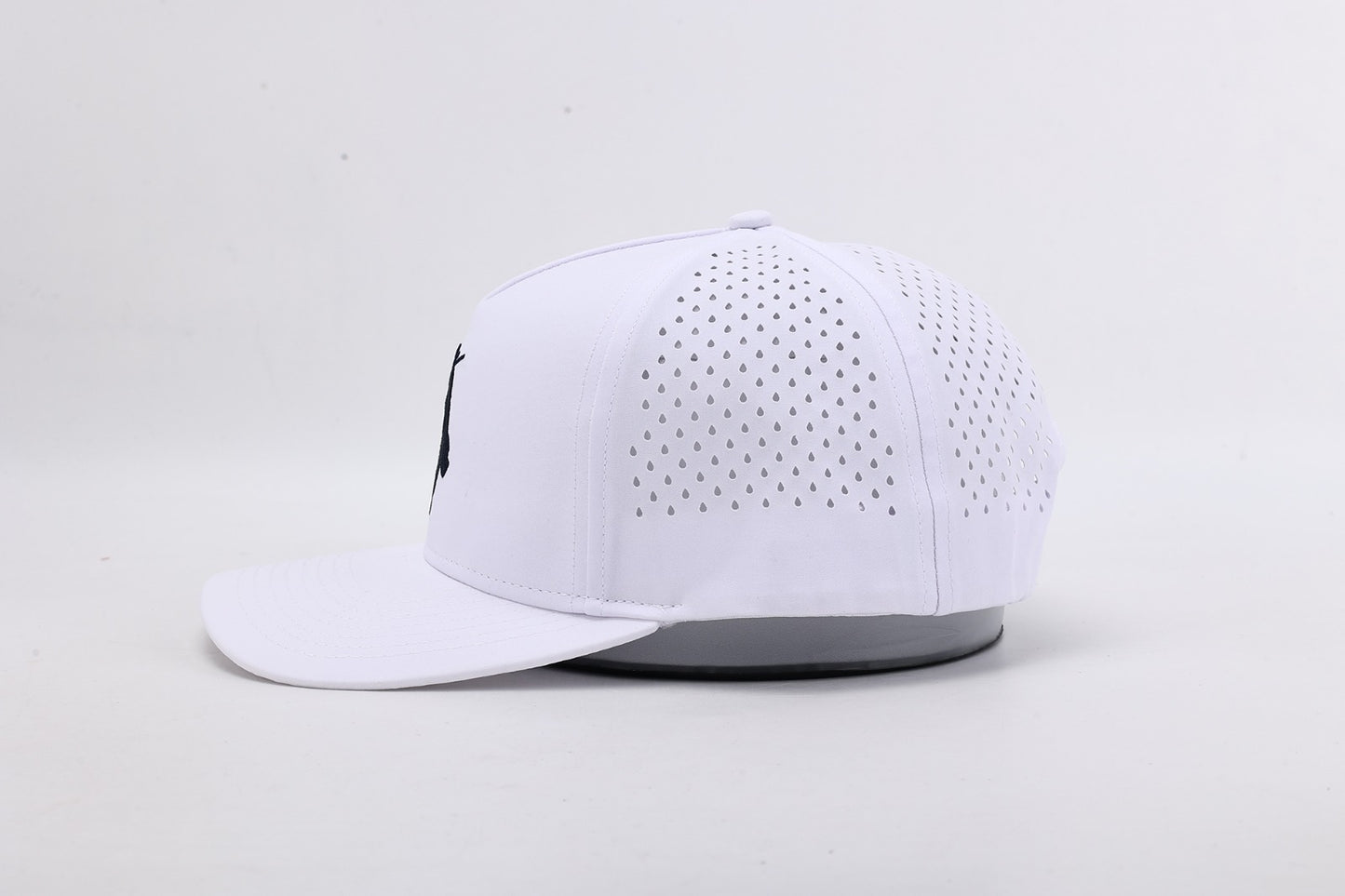 White baseball cap with gray brim on a light gray background