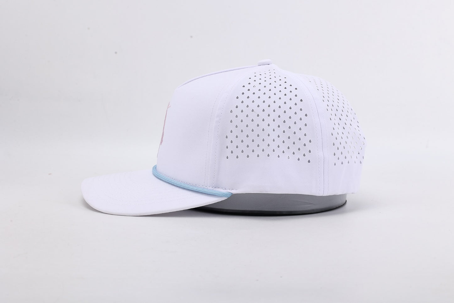 White baseball cap with gray brim on a light gray background