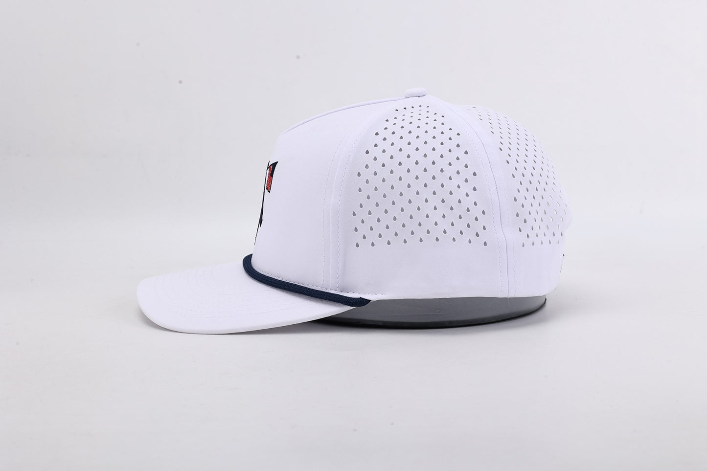 White baseball cap with a small logo on a light gray background